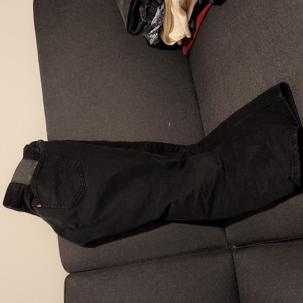 Black Levi's jeans.